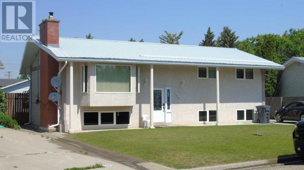 <div class="slider-price">$549,000</div><p>379 Oakwood Drive, Pincher Creek, Alberta</p>